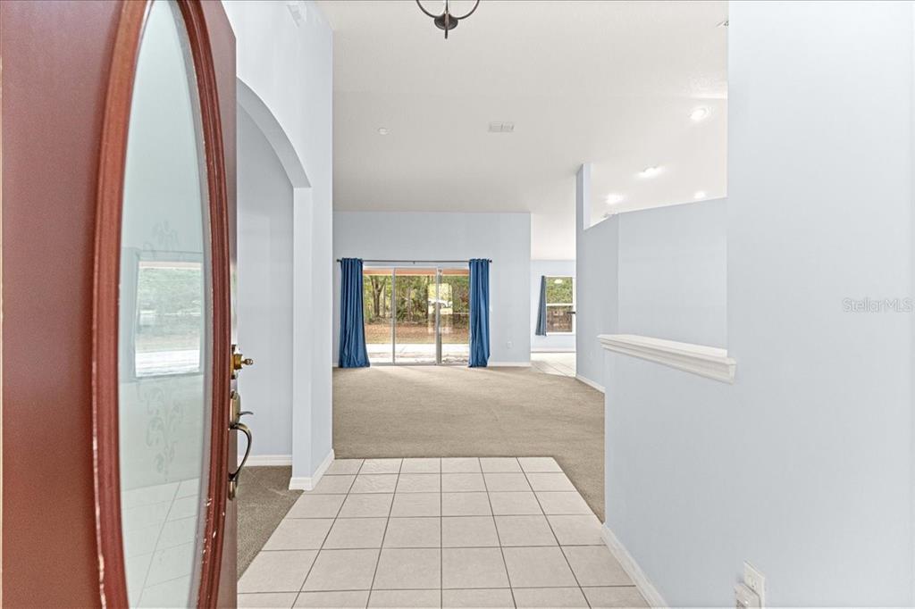 21595 Southwest 84th Loop Dunnellon, FL 34431 - Photo 4 of 62 a view of a bedroom with windows
