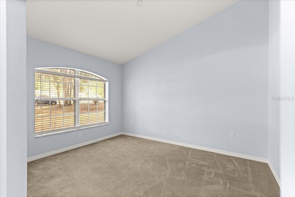 21595 Southwest 84th Loop Dunnellon, FL 34431 - Photo 5 of 62 an empty room with a window