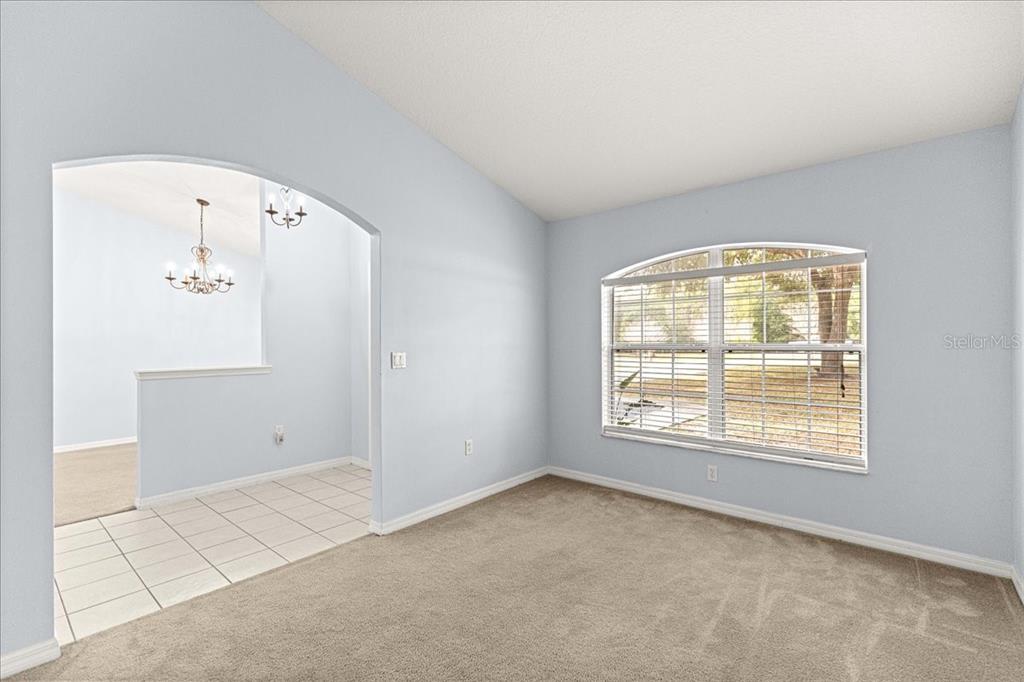 21595 Southwest 84th Loop Dunnellon, FL 34431 - Photo 7 of 62 an empty room with windows