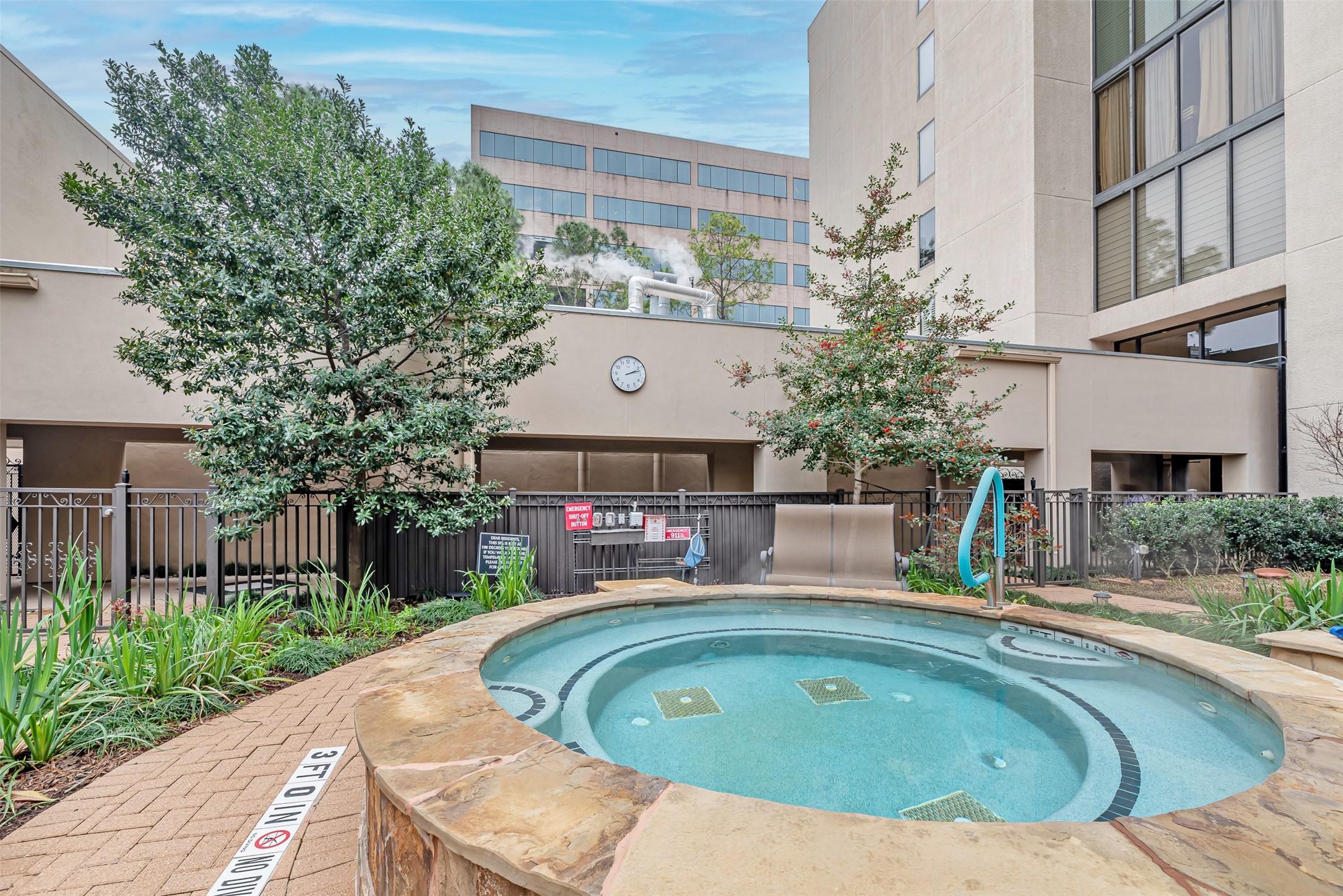 661 Bering Drive, Unit 404 Houston, TX 77057 - Photo 18 of 28 a view of balcony with a swimming pool and outdoor seating