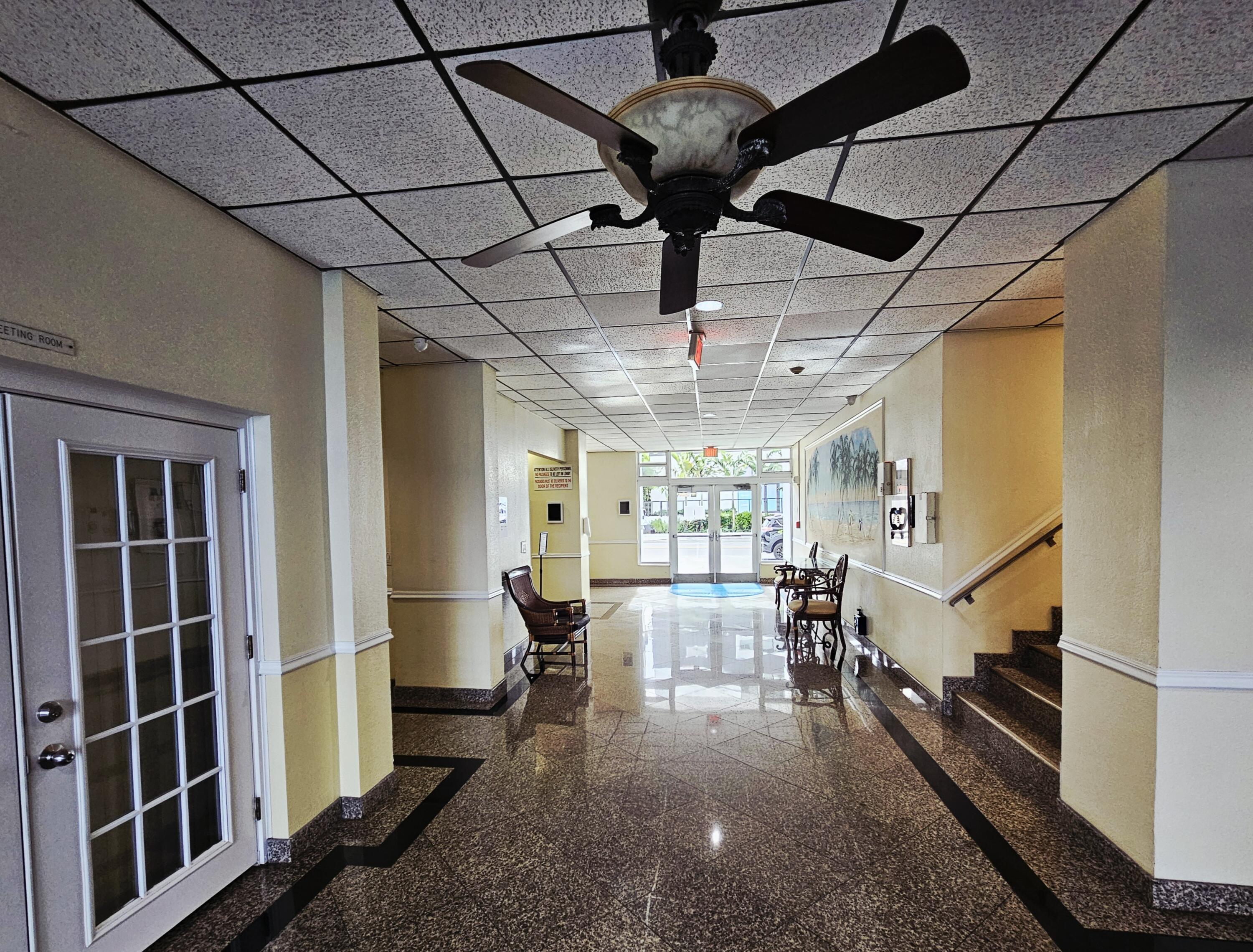 200 South Birch Road, Unit 208 Fort Lauderdale, FL 33316 - Photo 3 of 22 a view of a hall with wooden floor