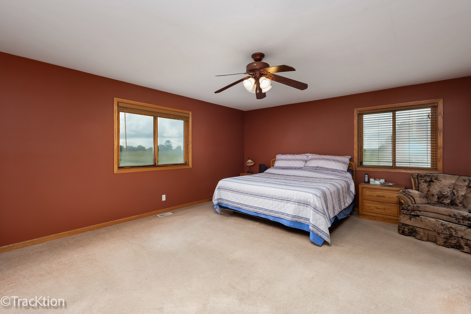 894 Moffet Road Paw Paw, IL 61353 - Photo 11 of 31 a bedroom with a large bed chandelier and a window