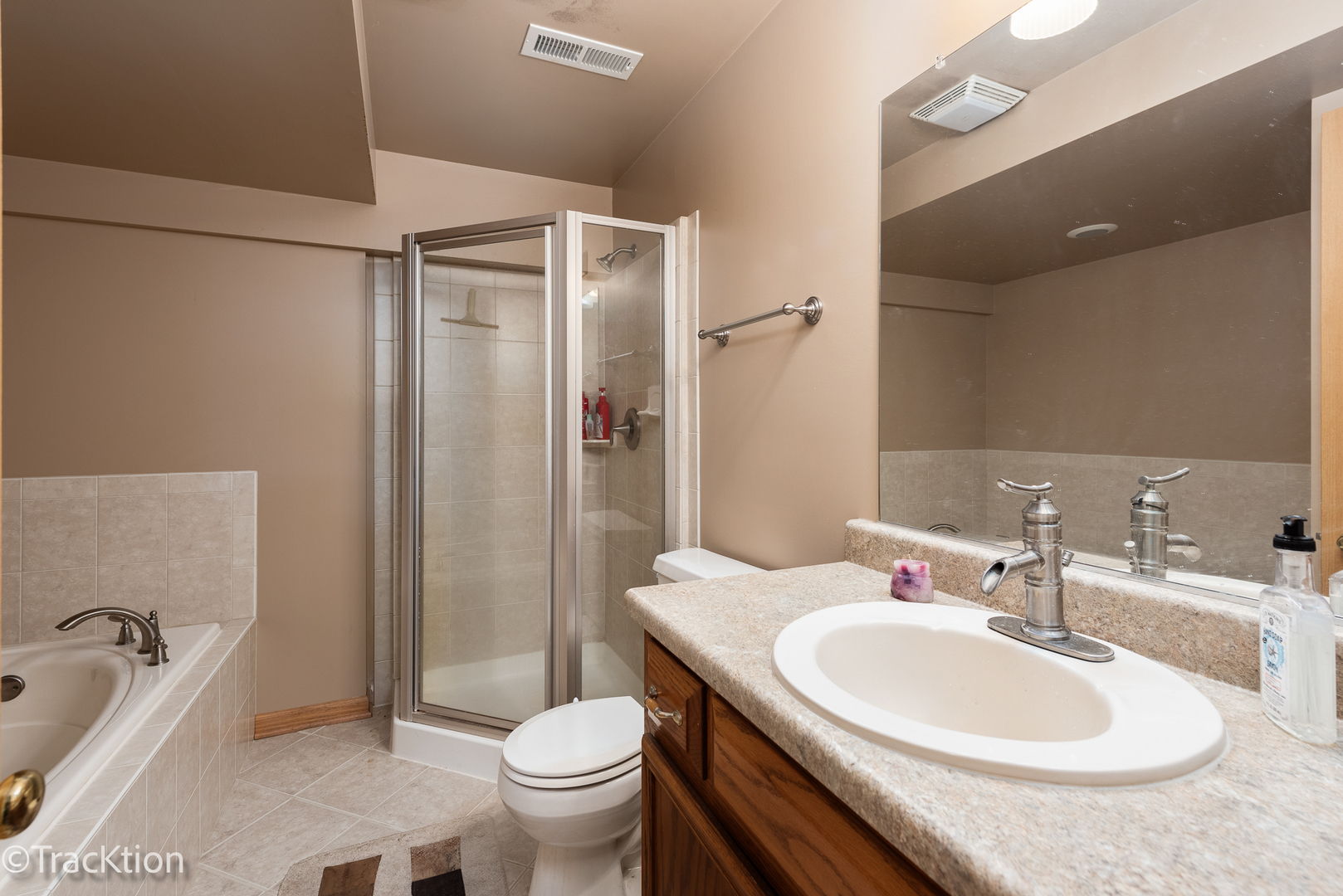 894 Moffet Road Paw Paw, IL 61353 - Photo 19 of 31 a bathroom with a granite countertop sink toilet and shower