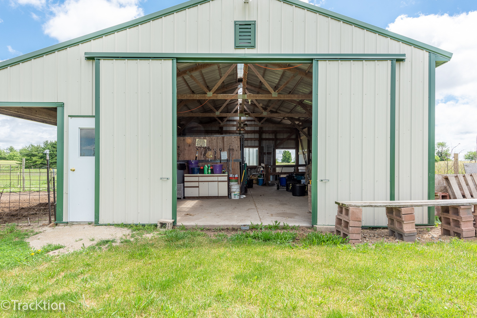 894 Moffet Road Paw Paw, IL 61353 - Photo 27 of 31 a view of a house with backyard porch and sitting area