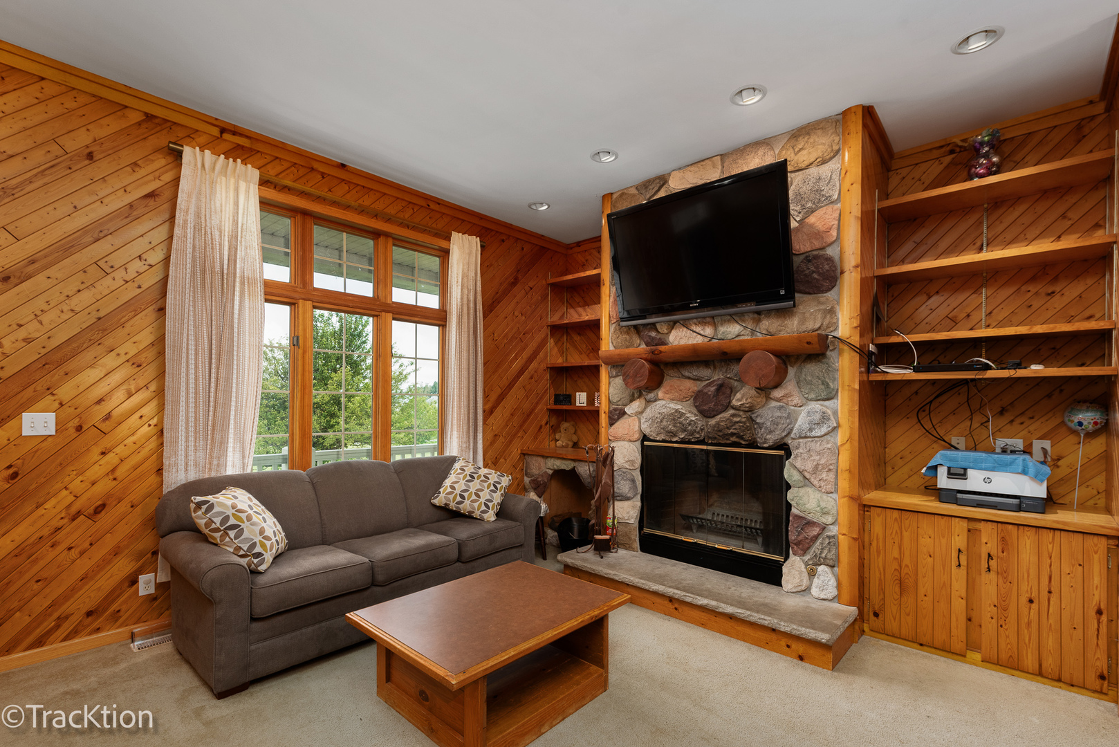 894 Moffet Road Paw Paw, IL 61353 - Photo 4 of 31 a living room with furniture a flat screen tv and a fireplace
