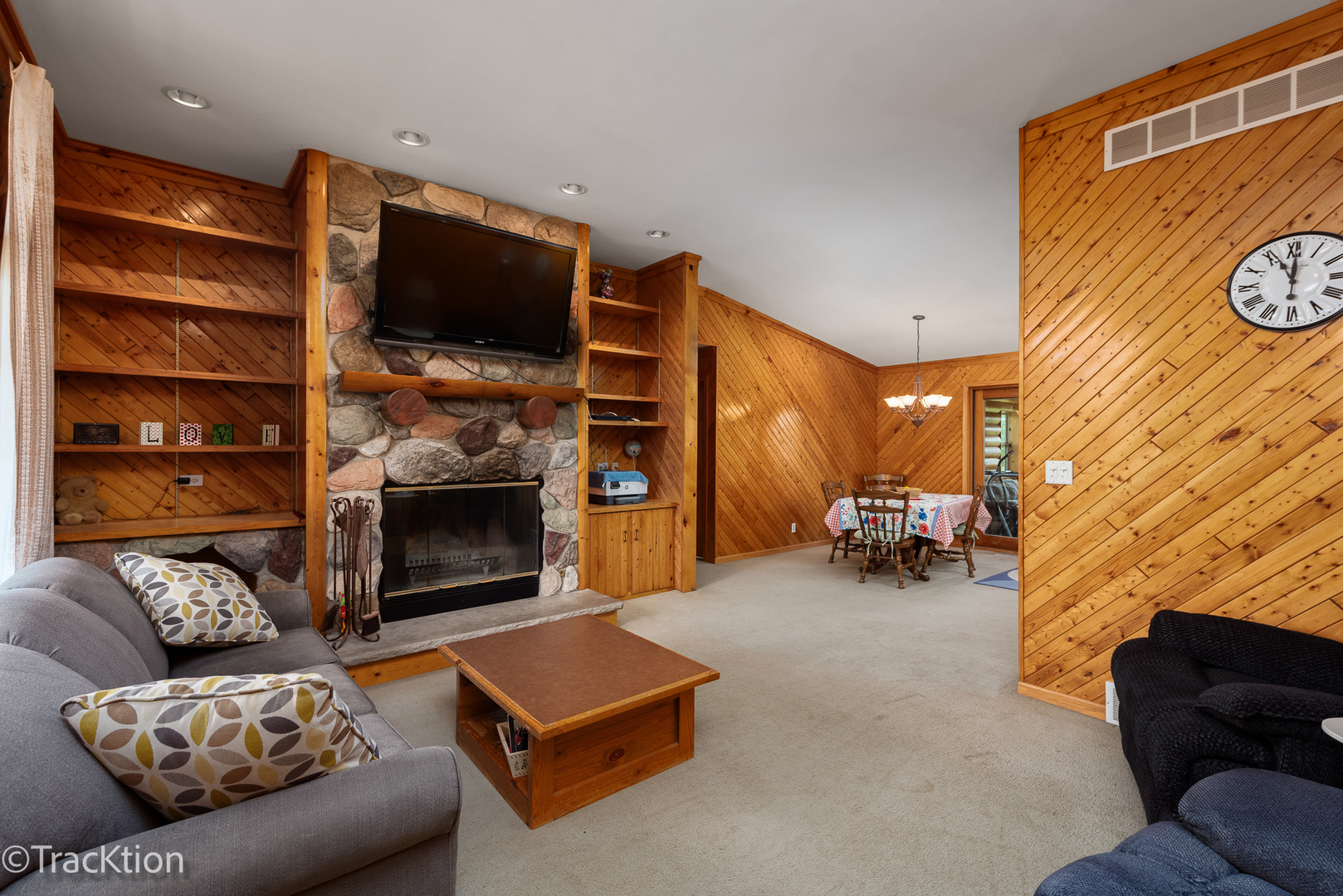 894 Moffet Road Paw Paw, IL 61353 - Photo 6 of 31 a living room with furniture flat screen tv and a fireplace