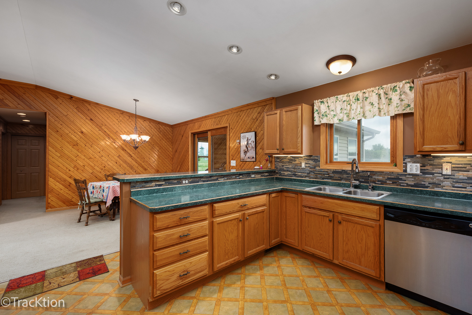 894 Moffet Road Paw Paw, IL 61353 - Photo 10 of 31 a kitchen with a sink stove and cabinets