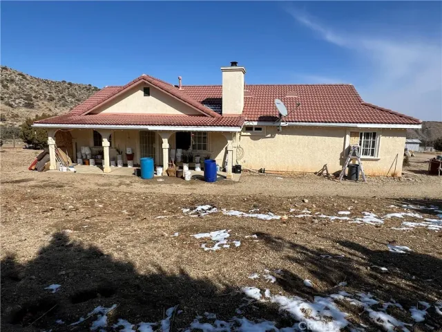 a view of a house with a park