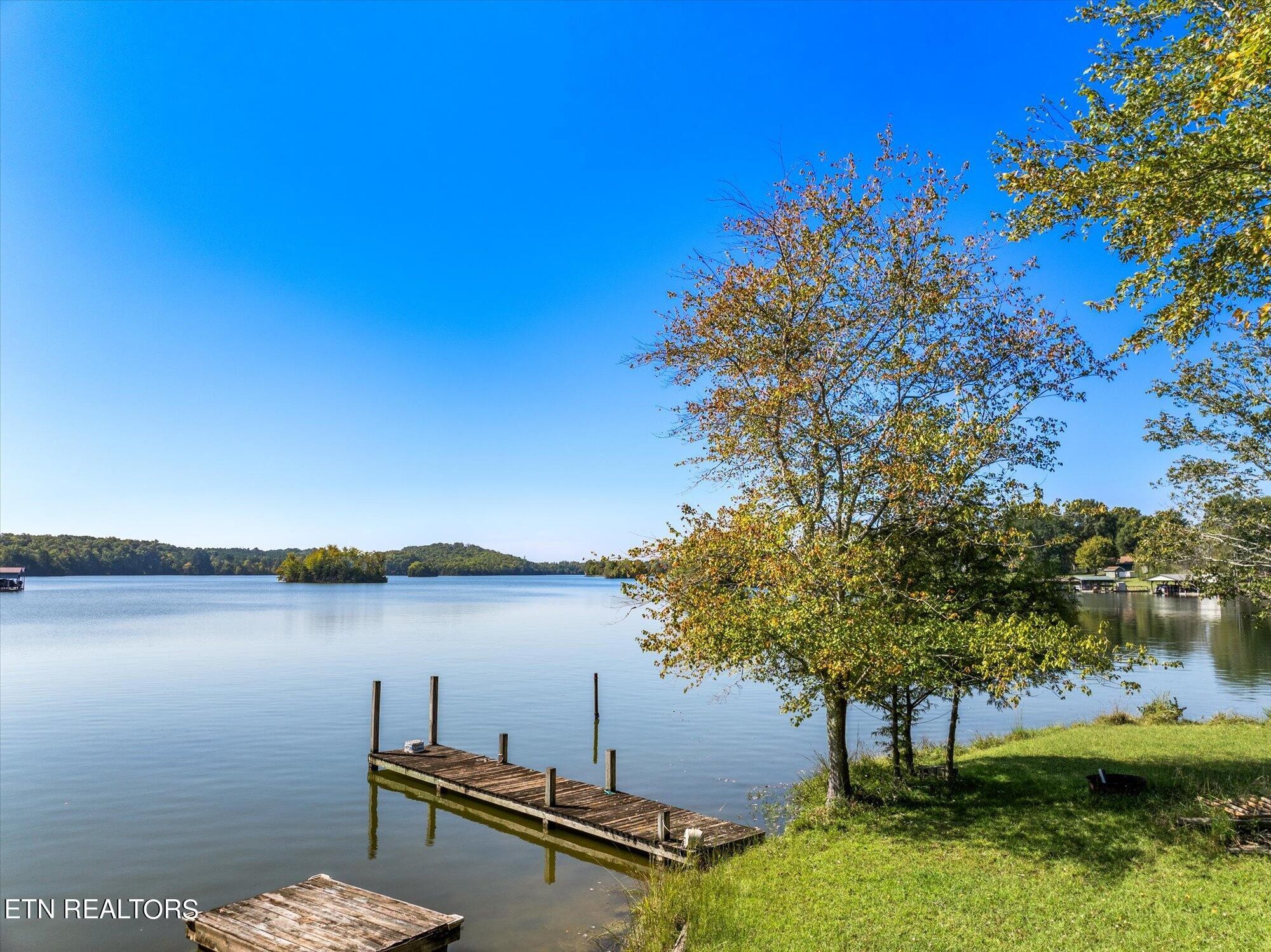0 Pin Hook (lot 1) Rd Spring Spring City, TN 37381 - Photo 1 of 14 a view of a lake with couches in the patio
