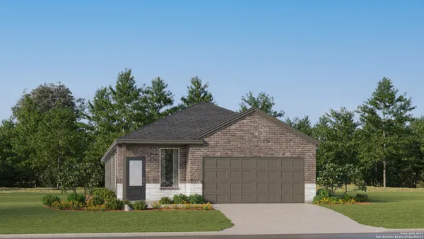 a front view of a house with a garden and trees