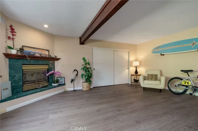 a view of livingroom with furniture and a fireplace