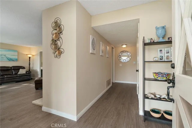 a view of livingroom with furniture and wooden floor
