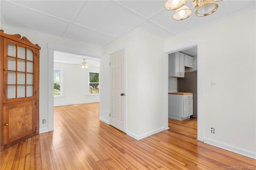 22 Sycamore Lane Waterbury, CT 06705 - Photo 9 of 31 a view of hallway with wooden floor