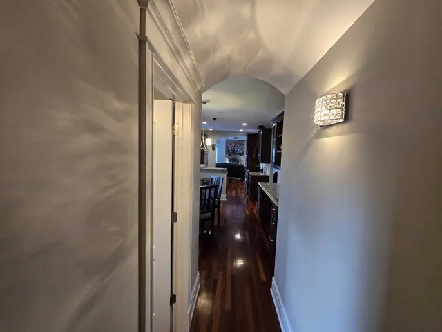 a bathroom with double vanity and a bathtub