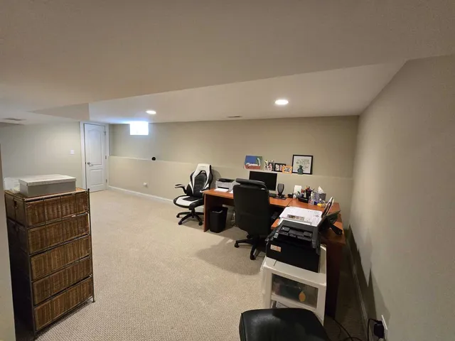 a bathroom with a sink toilet a mirror and bathtub