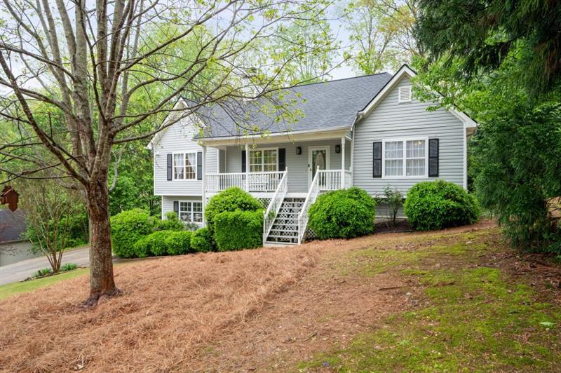 350 Spring View Court Dallas, GA 30157 - Photo 1 of 1 a front view of a house with a yard and trees
