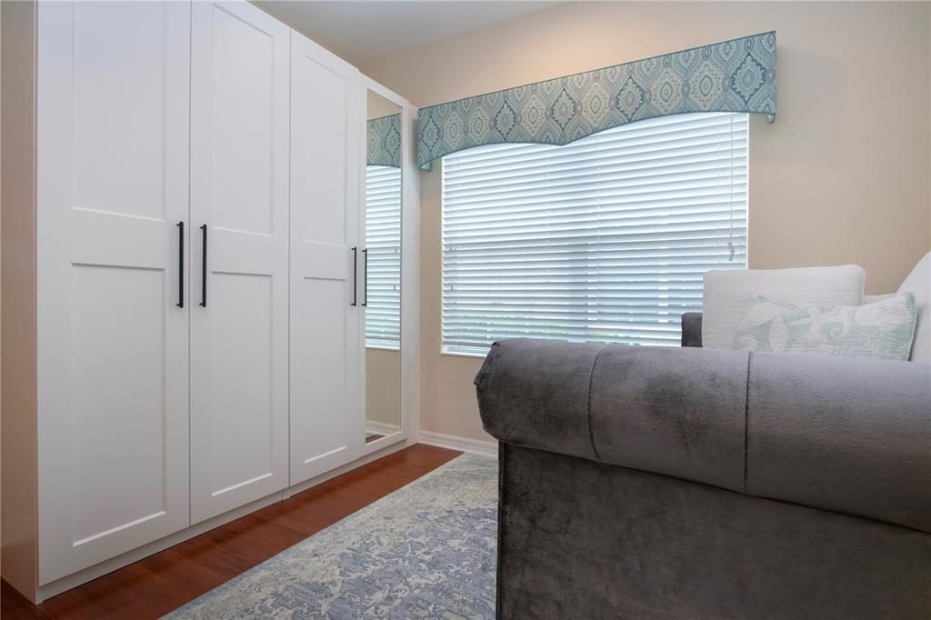 4920 Maymont Park Circle Bradenton, FL 34203 - Photo 48 of 59 a bedroom with a bed and a window