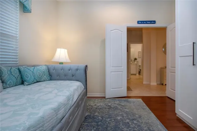 a view of a patio with chairs and table in patio
