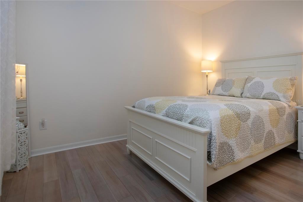 4920 Maymont Park Circle Bradenton, FL 34203 - Photo 50 of 59 a bedroom with a bed and a window