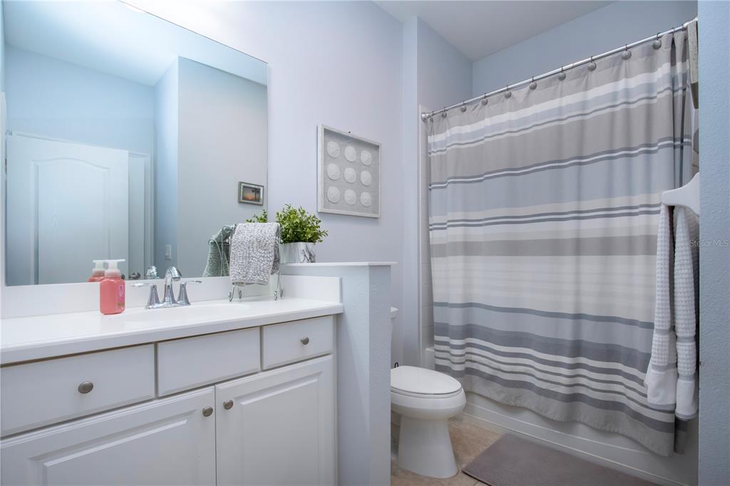 4920 Maymont Park Circle Bradenton, FL 34203 - Photo 54 of 59 a bathroom with a sink a toilet and shower
