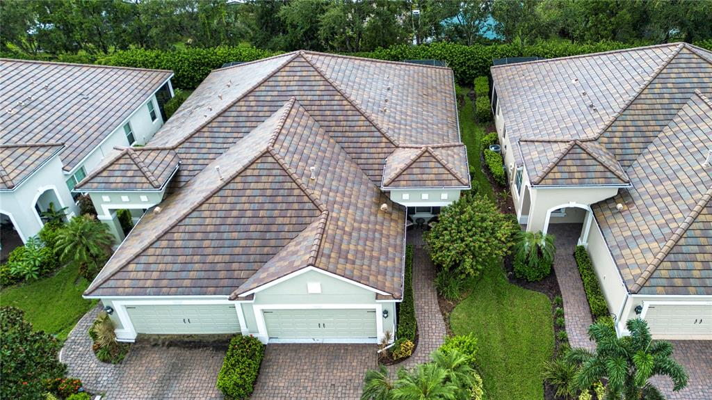 4920 Maymont Park Circle Bradenton, FL 34203 - Photo 6 of 59 a aerial view of a house with a yard