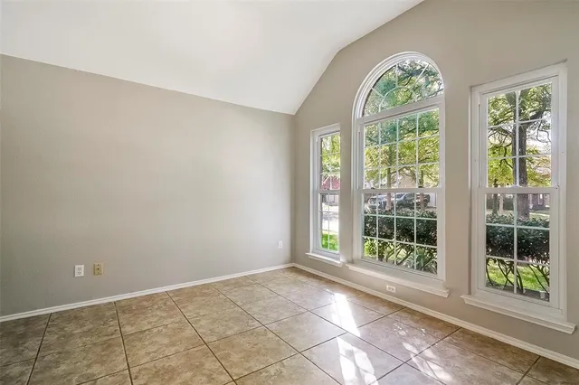 a kitchen with a sink and refrigerator