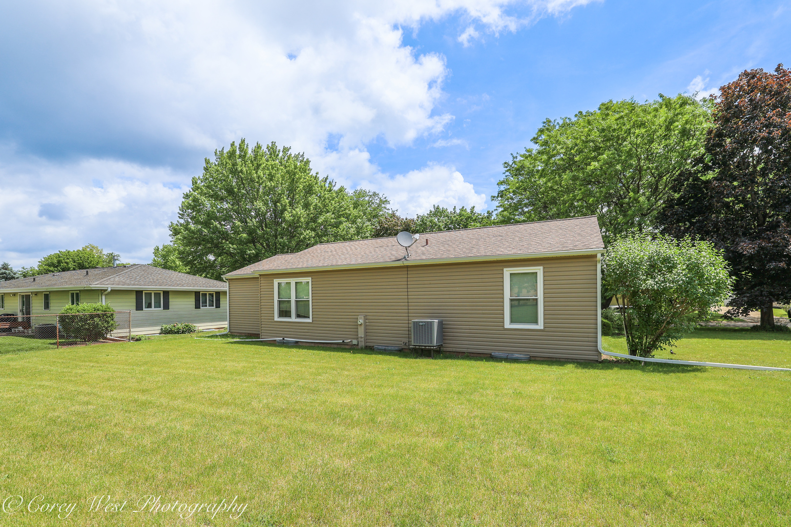 335 South Hadsall Street Genoa, IL 60135 - Photo 19 of 23 a view of a house with a garden and yard
