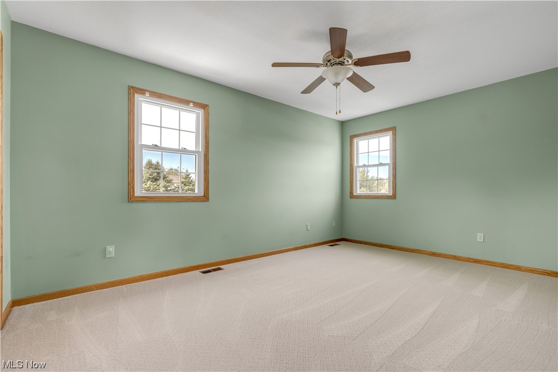 2652 Woodview Road Uniontown, OH 44685 - Photo 31 of 35 View of bedroom 4 large and spacious with all brand new carpet.