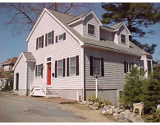 17 Stonecleve Road Wellesley, MA 02482 - Photo 1 of 6 a view of a house with a yard