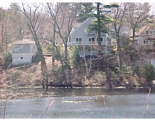 17 Stonecleve Road Wellesley, MA 02482 - Photo 2 of 6 a front view of a house with a yard