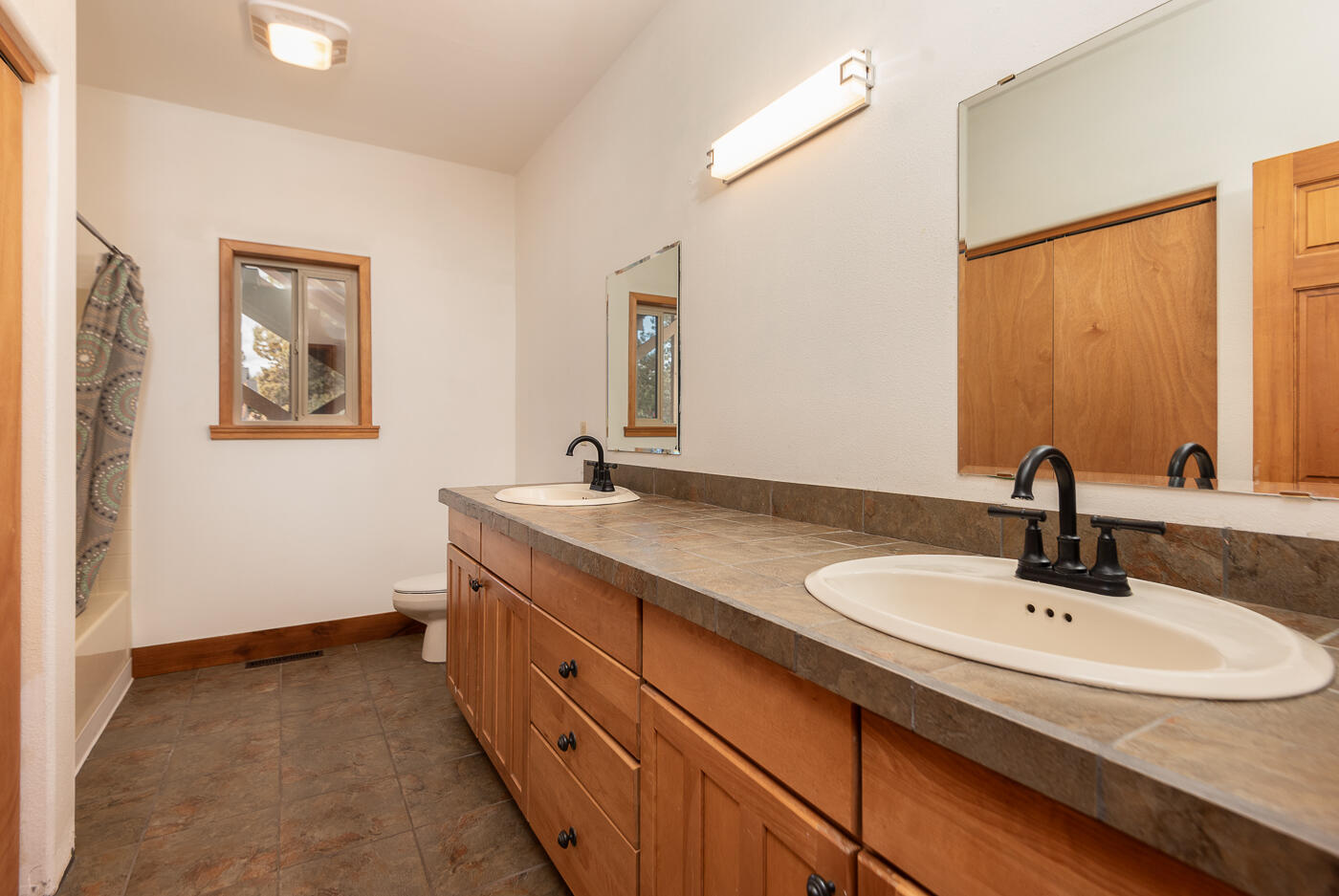 21037 Southwest Gift Road Bend, OR 97703 - Photo 30 of 39 Downstairs full bath with dual sinks