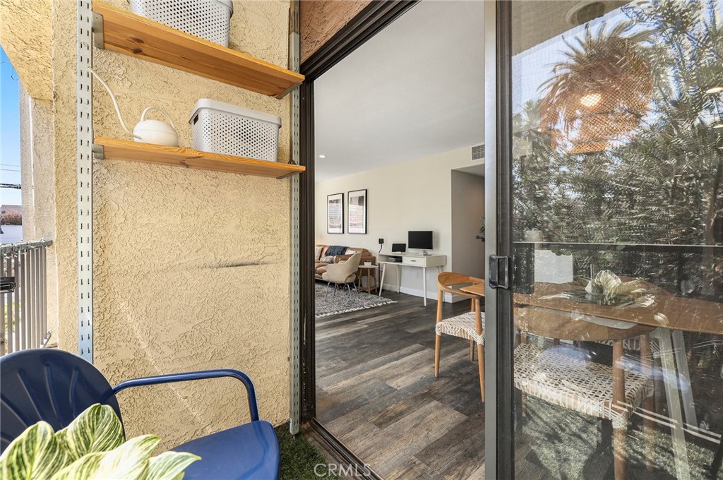 2135 East 4th Street, Unit 202 Long Beach, CA 90814 - Photo 19 of 23 a balcony view with a couch