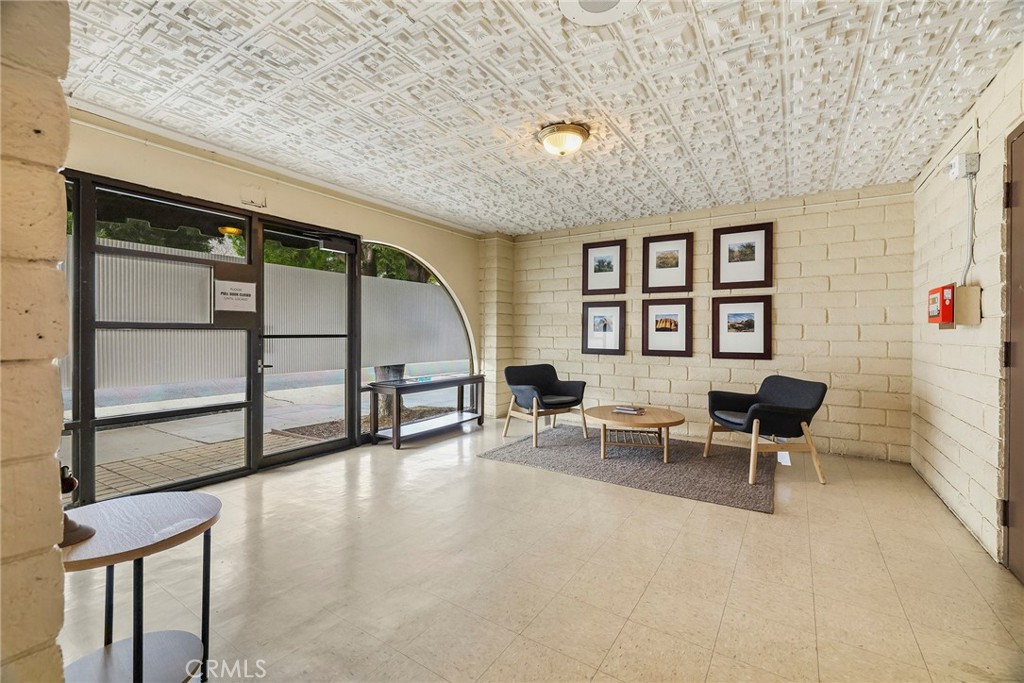 2135 East 4th Street, Unit 202 Long Beach, CA 90814 - Photo 22 of 23 a living room with furniture