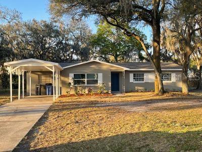 3620 North Frontage Road Plant City, FL 33565 - Photo 1 of 1 a front view of a house with a yard