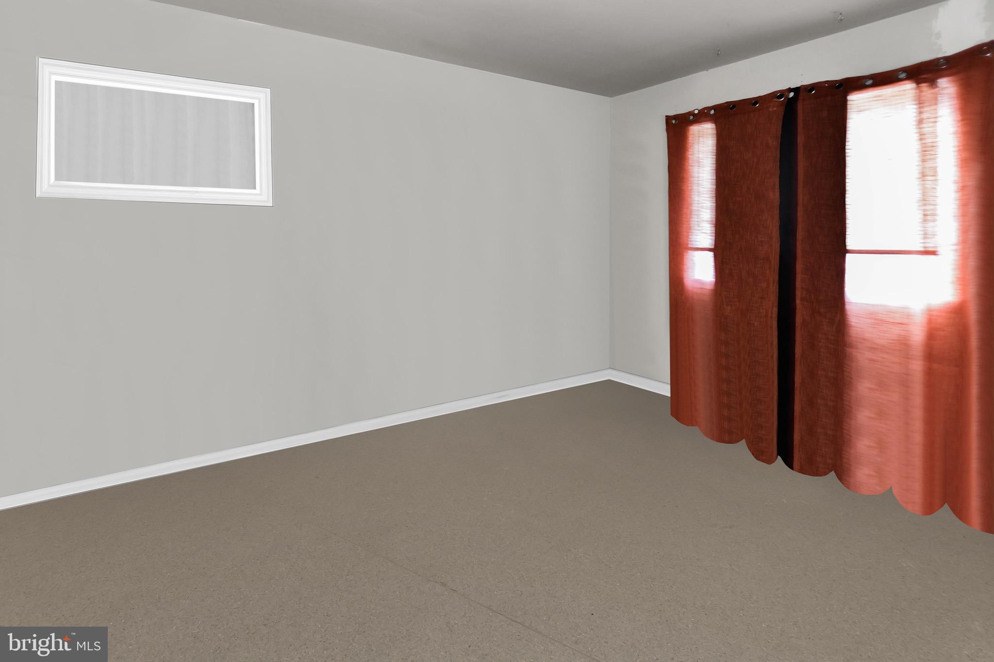 5009 D Street Southeast, Unit 202 Washington, DC 20019 - Photo 7 of 12 an empty room with windows