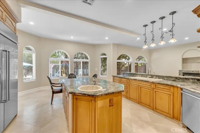 an empty room with closet and cabinet