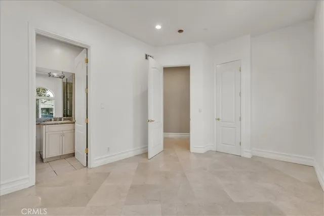 a view of entryway and hall with a front door