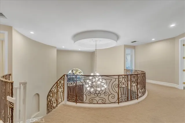 a bathroom with a granite countertop sink a toilet a mirror a bathtub and shower