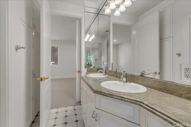 a front view of a house with yard and green space