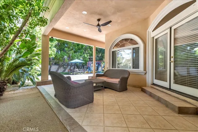 a view of backyard of house with green space