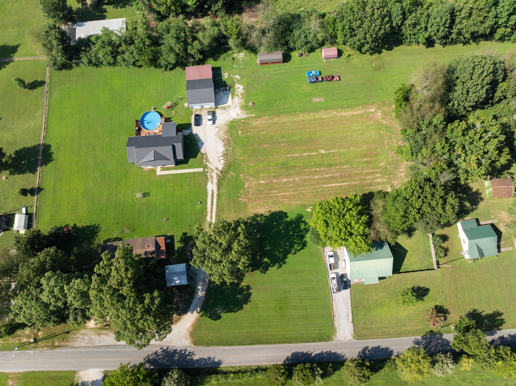 227 Pleasant View Road White Bluff, TN 37187 - Photo 17 of 19 an aerial view of a house with a yard basket ball court and outdoor seating
