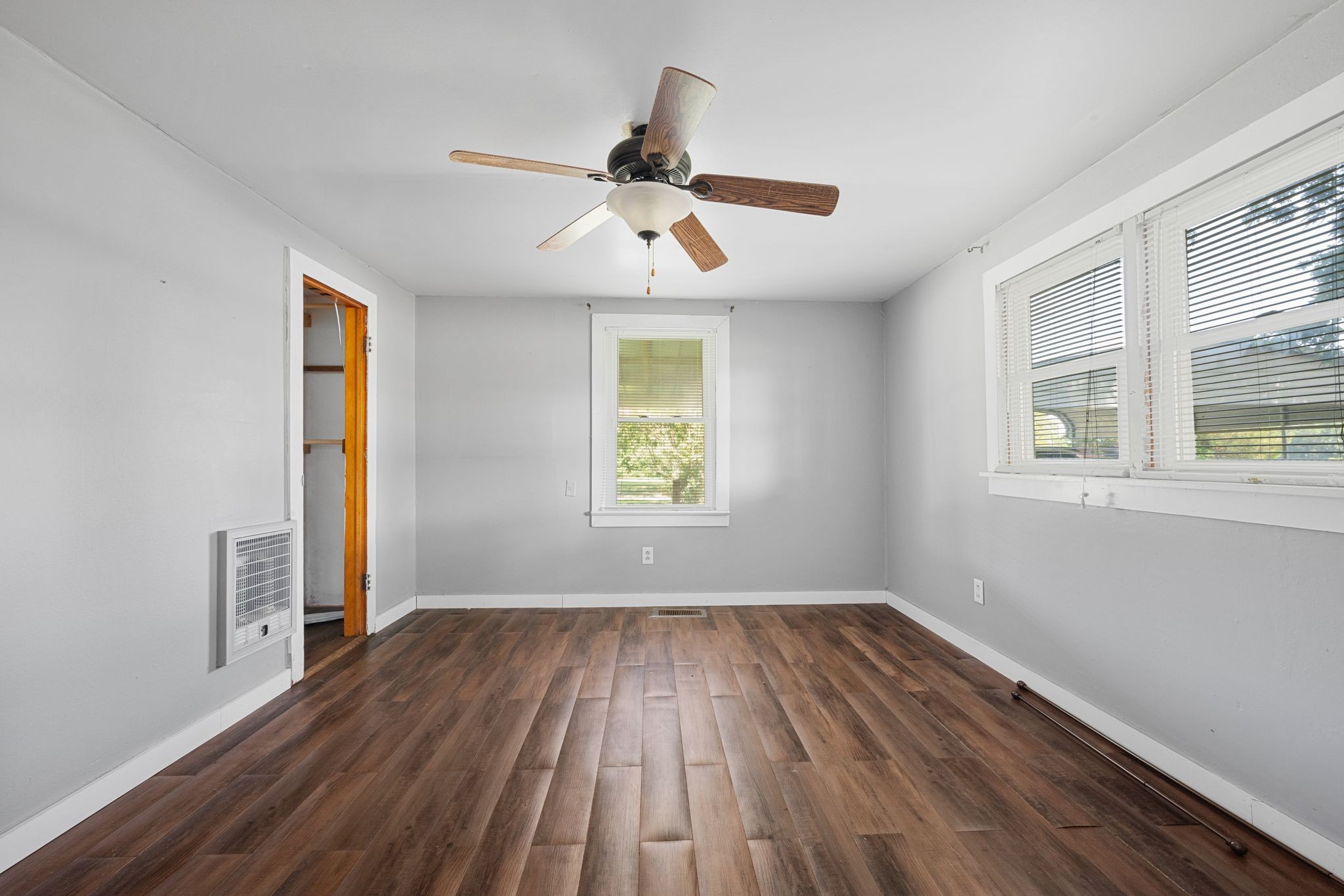 227 Pleasant View Road White Bluff, TN 37187 - Photo 4 of 19 wooden floor in an empty room with a window