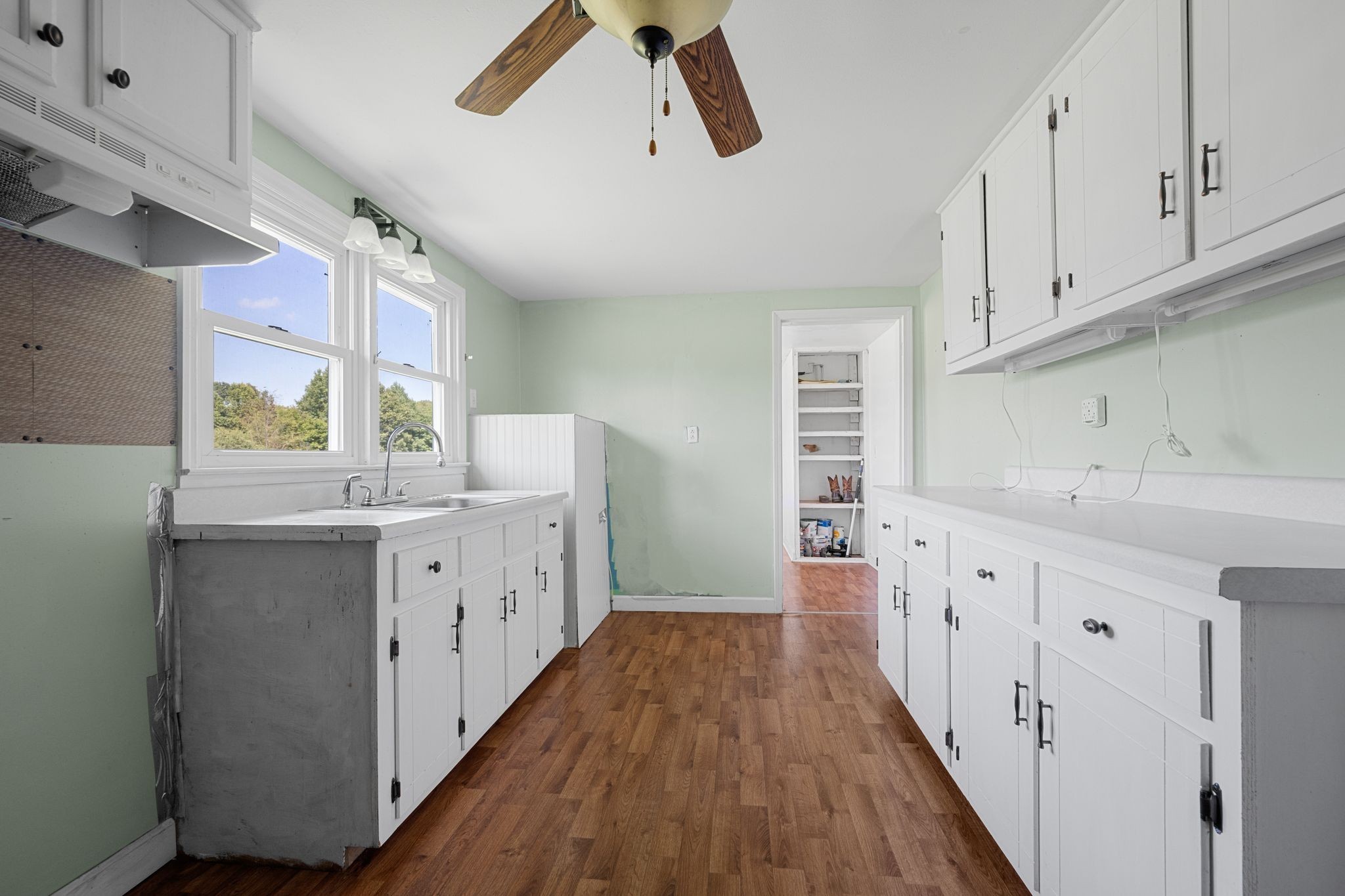 227 Pleasant View Road White Bluff, TN 37187 - Photo 6 of 19 a kitchen with cabinets a sink and appliances
