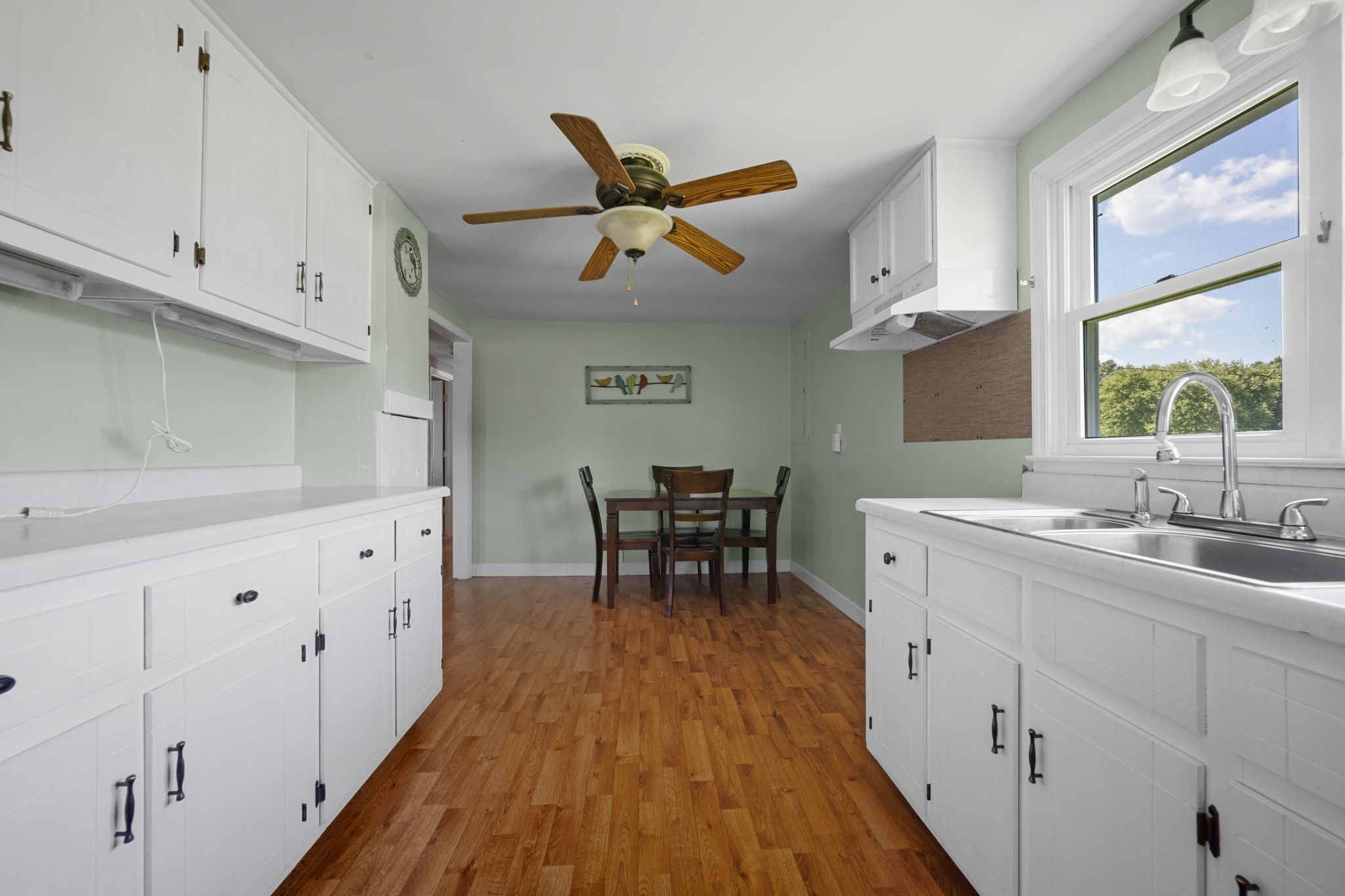 227 Pleasant View Road White Bluff, TN 37187 - Photo 7 of 19 a kitchen with a sink and cabinets