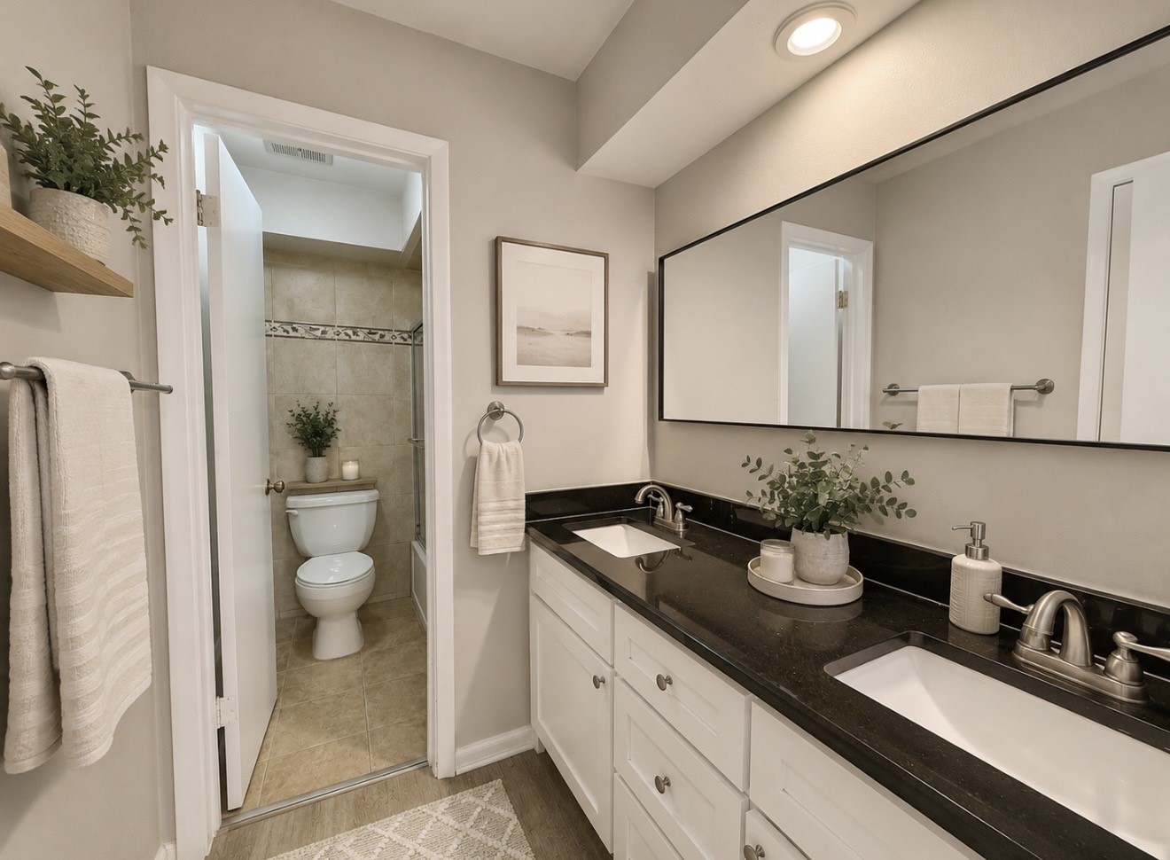 5100 Allendale Road, Unit 206 Houston, TX 77017 - Photo 7 of 9 a bathroom with a granite countertop sink a toilet and a mirror