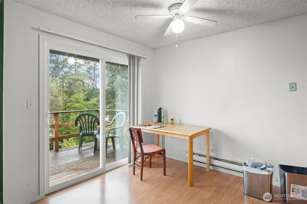 a view of a dining room with furniture window and outside view