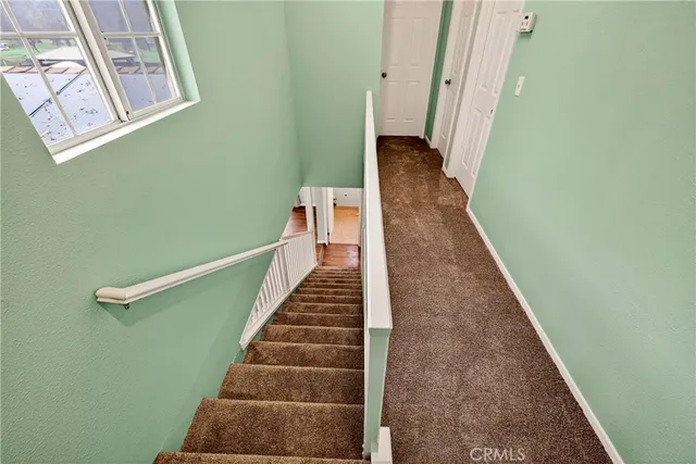a view of a house with swimming pool