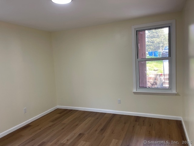 280 Meriden Road Waterbury, CT 06705 - Photo 16 of 27 an empty room with a window