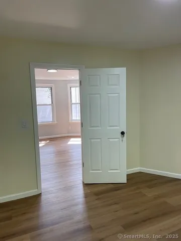 a view of a livingroom with wooden floor