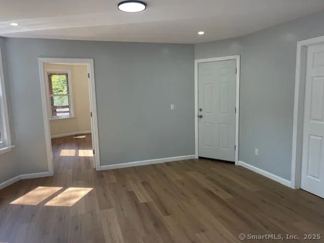 a view of an empty room and window